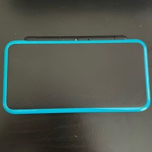 Nintendo 2ds XL with stylus/charger included. No Mario Kart from factory reset